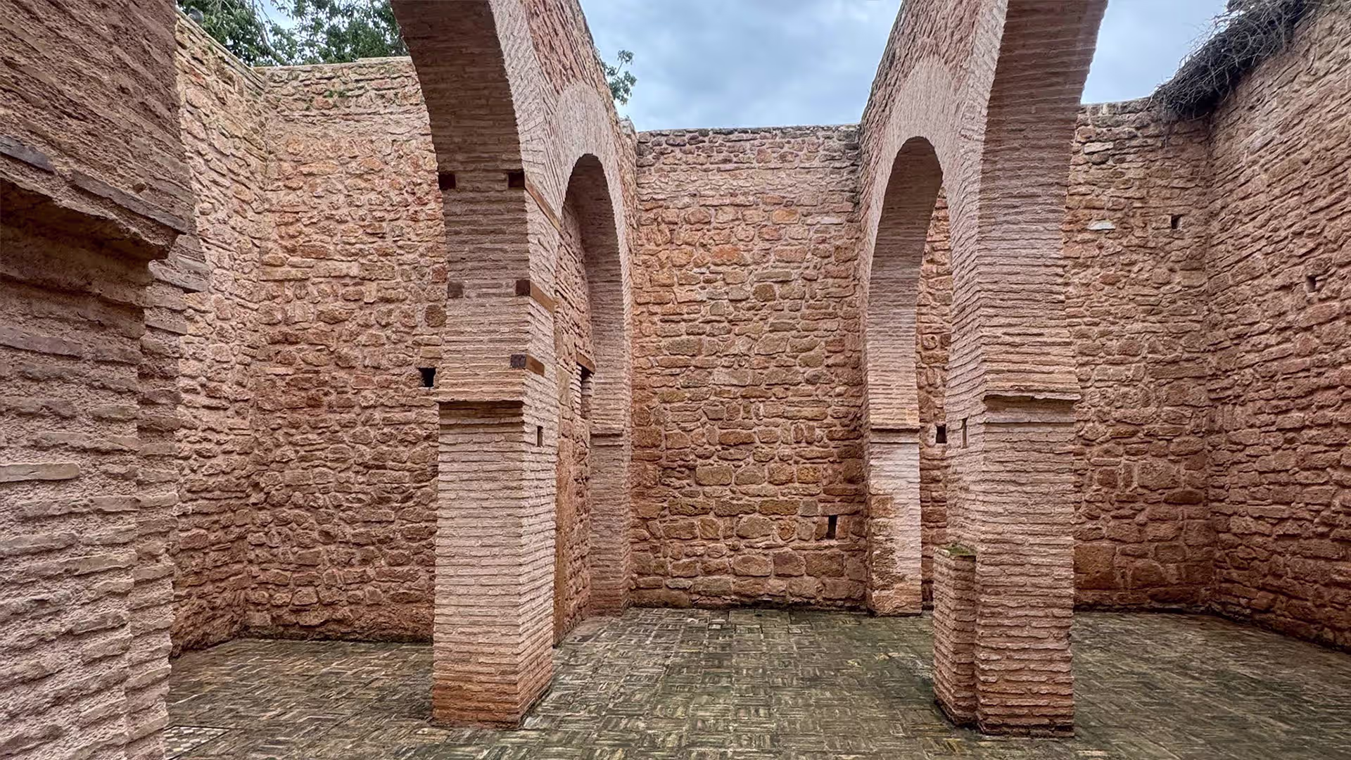 Brick archways inside the historic Chellah ruins