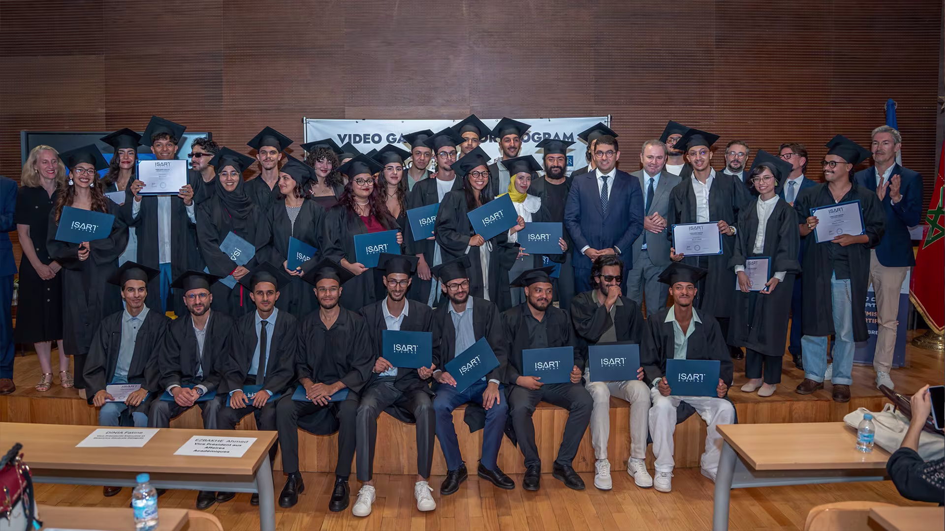 Video Game Creator 2025 graduates holding their certificates after the ceremony