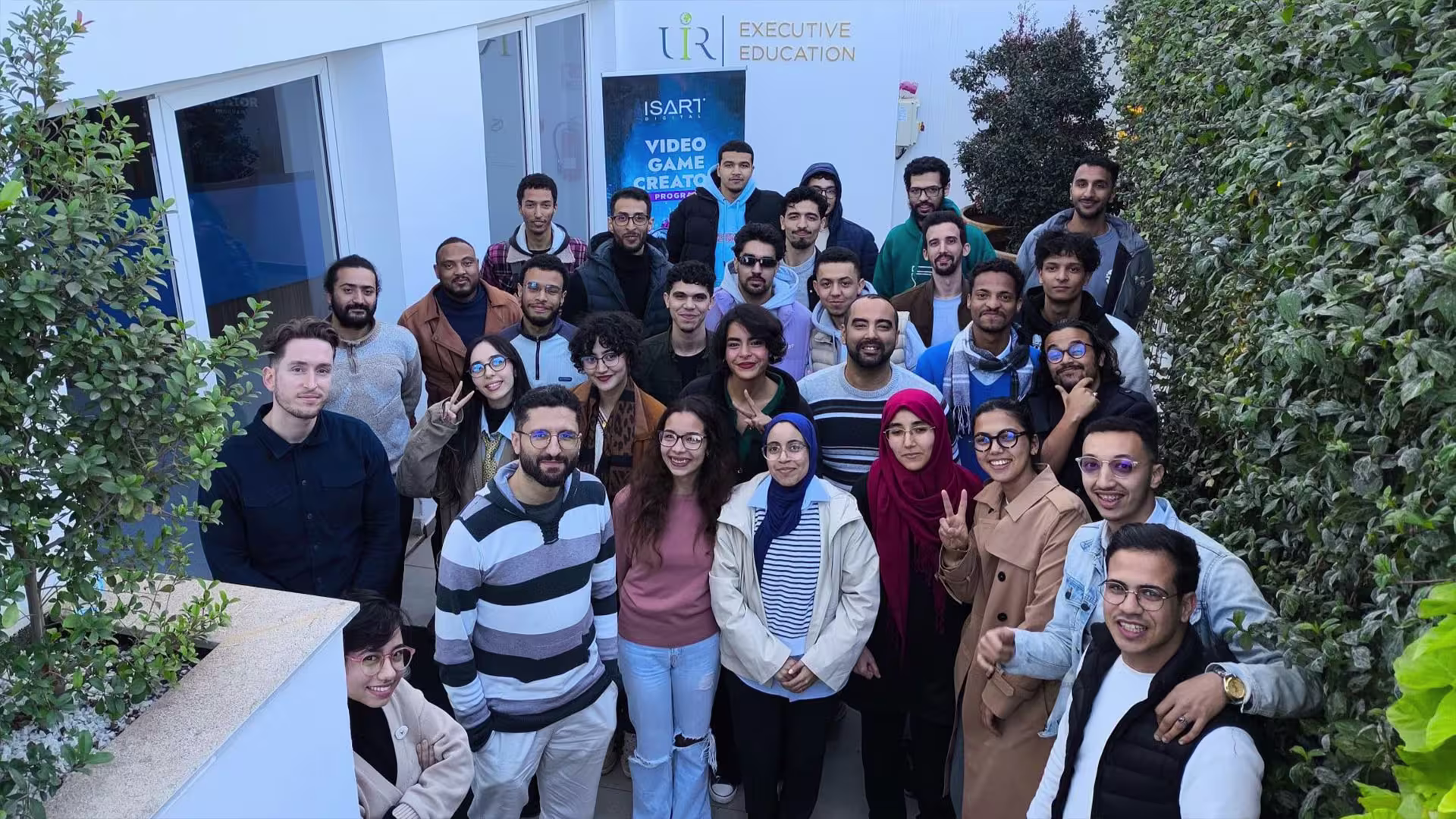 Video Game Creator students and mentors gathered for an outdoor group photo