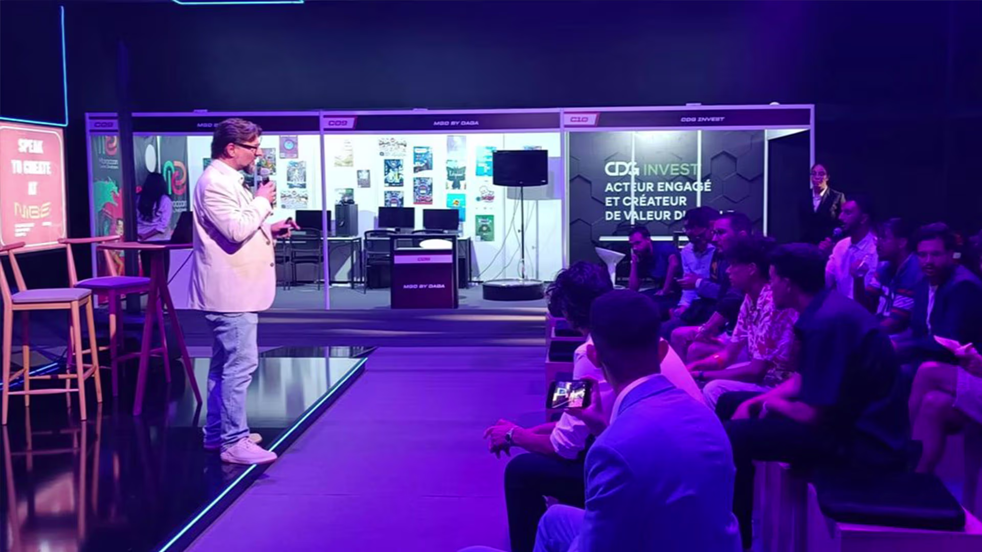 Student pitching a game to the Moroccan Gaming Expo audience