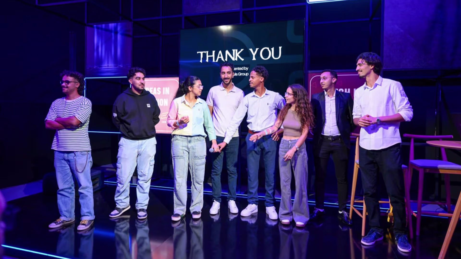 Video Game Creator team receiving recognition on the expo stage